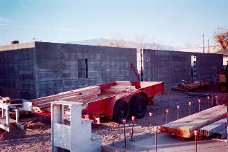 11/30 7:51 Day #2 begins. Walls are erected to 8 ft. with most door and window openings cut out.